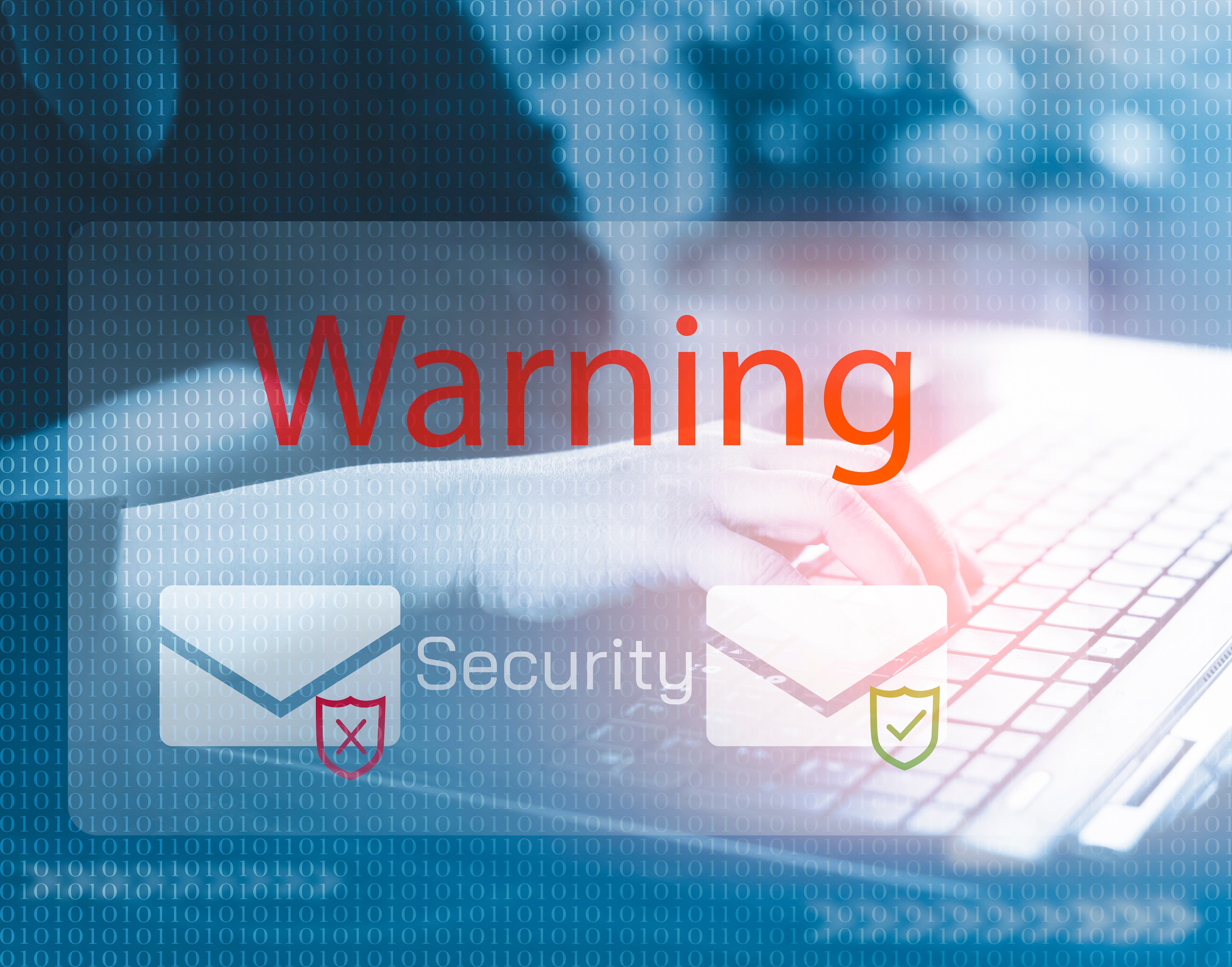 An image of someone typing on their keyboard with a blue overlay and the words "warning" and "security" displayed along side two envelopes with a check mark and an X indicating safe and not safe.